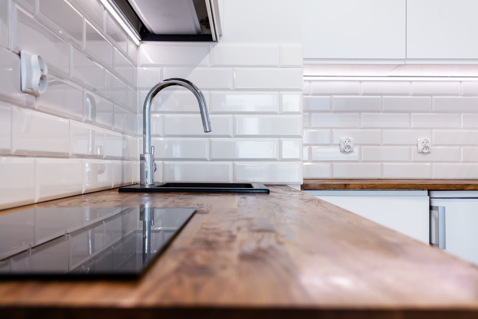 New clean kitchen with wooden table top — the kind of handyman work our vetted local pros handle in Sarasota, FL
