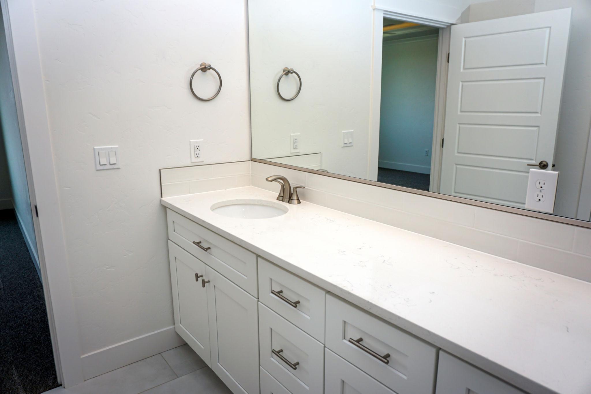 Bathroom vanity installation Sarasota countertop upgrade small bathroom cabinet sink replacement