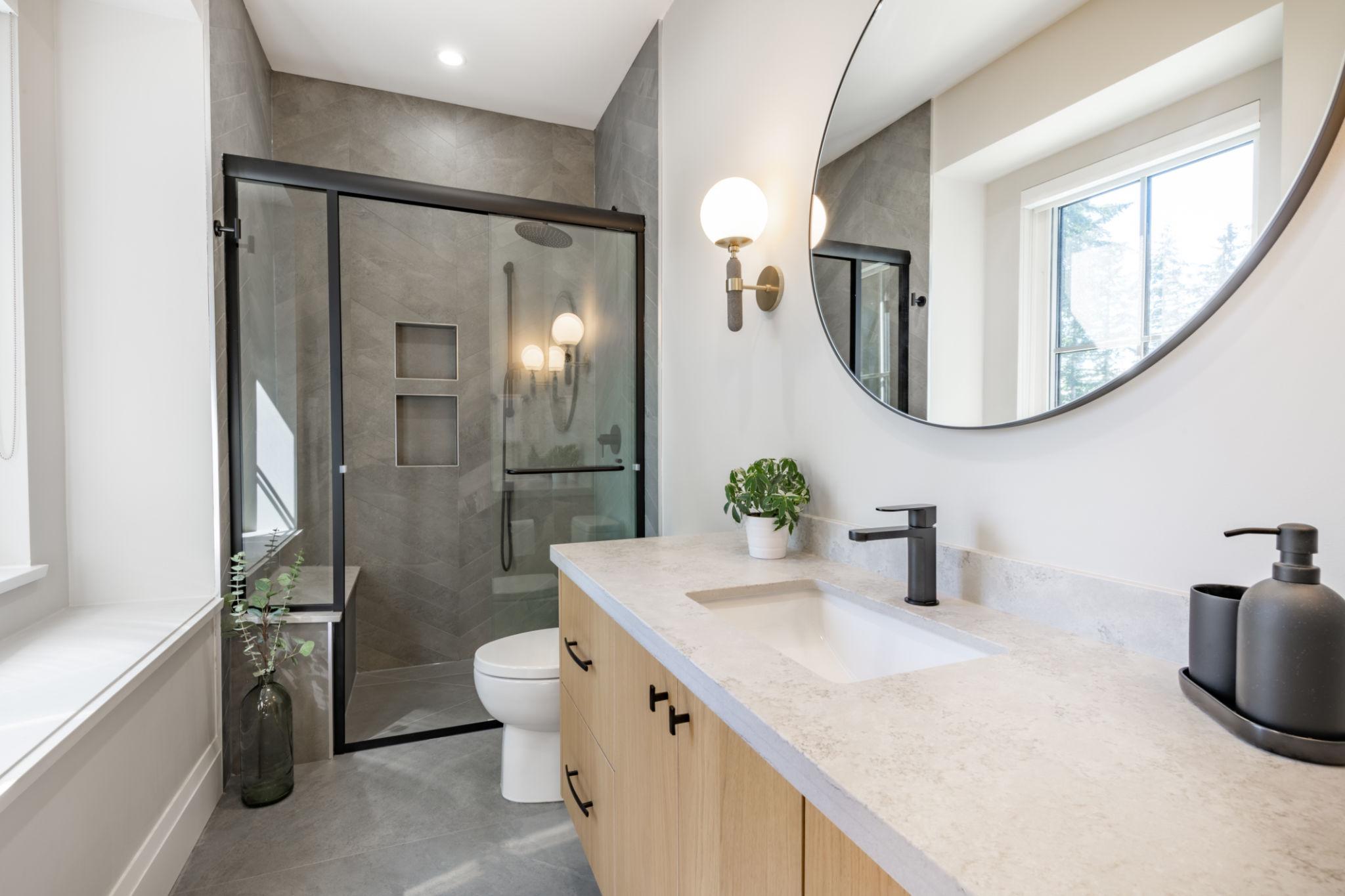 Bright and clean bathroom staged for home buyers in Sarasota real estate market