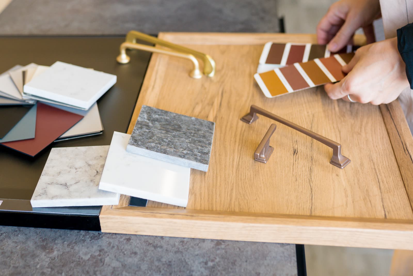 Designer woman choosing details of new kitchen in — the kind of handyman work our vetted local pros handle in Sarasota, FL