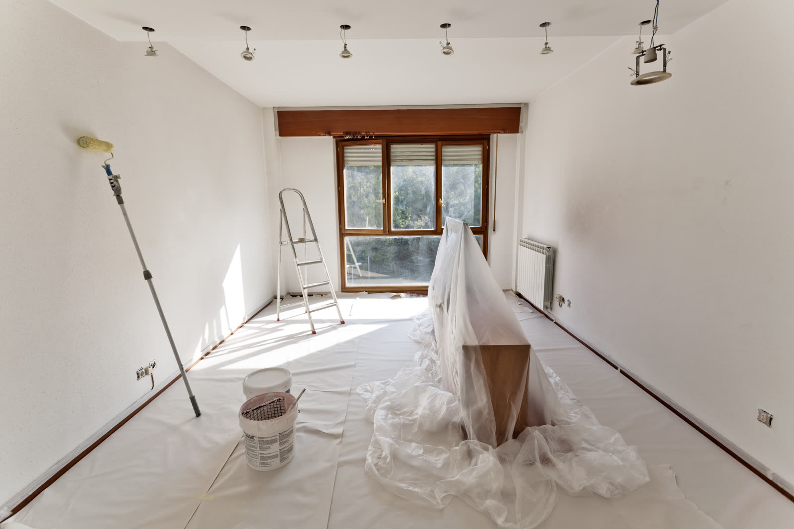 interior room preparation for painting with drop c — Rental Repair & Maintenance in Sarasota, FL