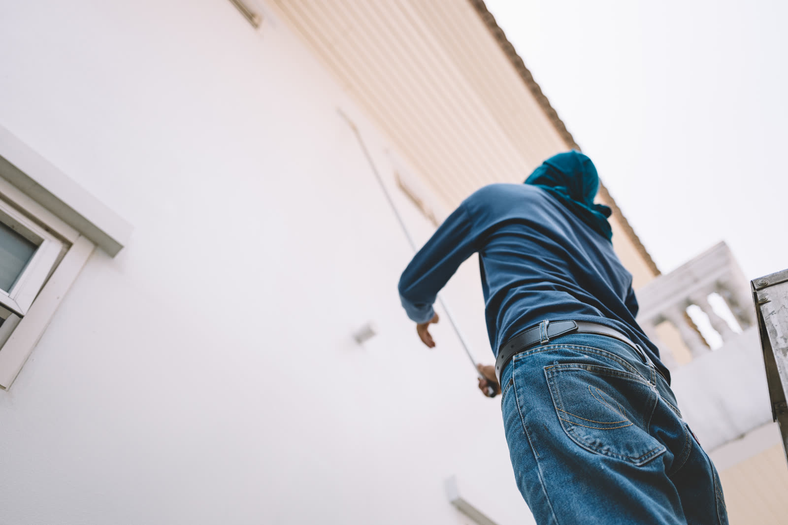 man painting white wall — Painting (Interior & Exterior) in Sarasota, FL