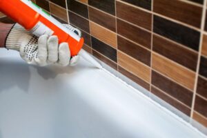 Bathroom caulking and grout sealing Sarasota tub shower tile sealing repair handyman