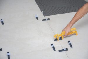 High-resolution close-up of professional tile flooring installation